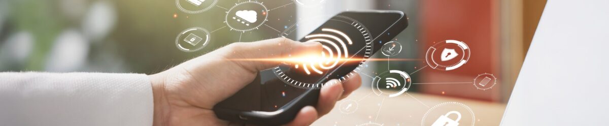 Hand holding smartphone with digital icons for cloud, Wi-Fi and security – illustration of cybercrime and IT security